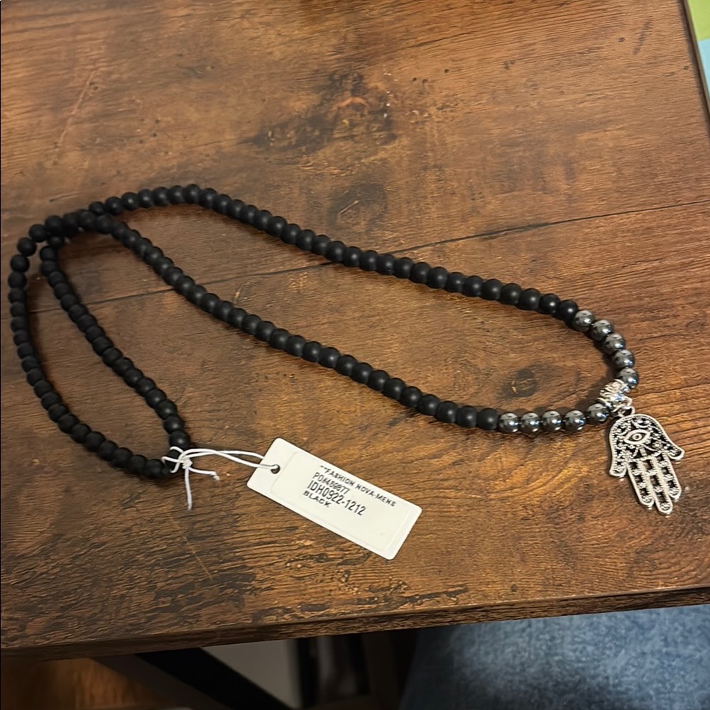 Silver and Black Beaded Necklace with Hamsa Pendant
